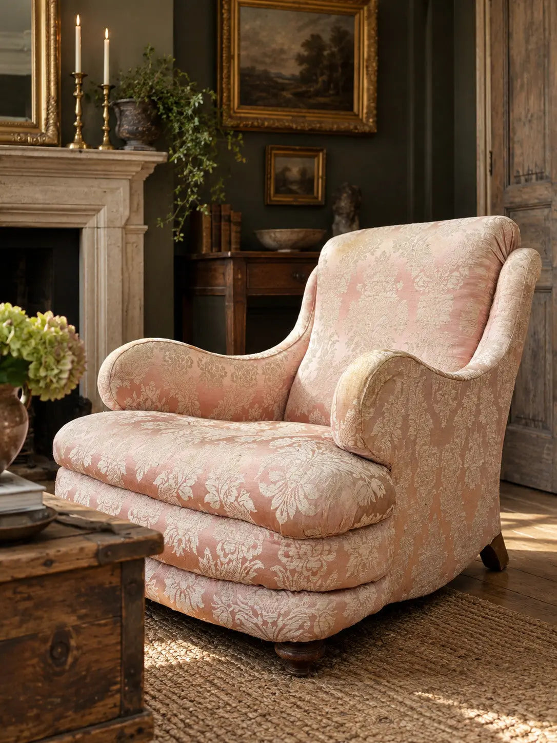 Late Victorian armchair pink silk damask floral pattern with curved rolled arms.
