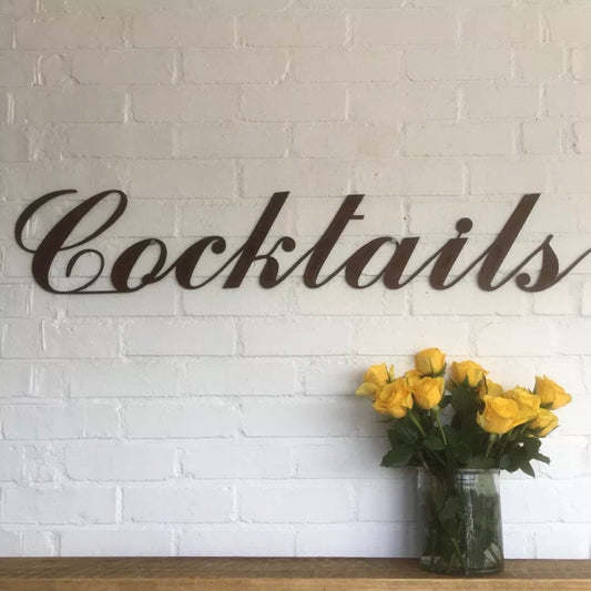 rusty metal cocktails sign