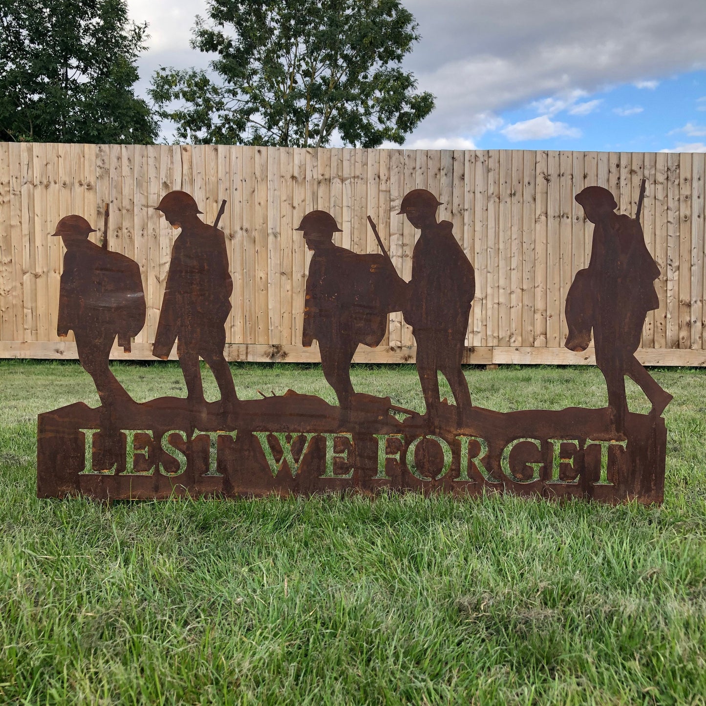 A Rusty Metal Lest We Forget Soldier Scene Garden Decoration