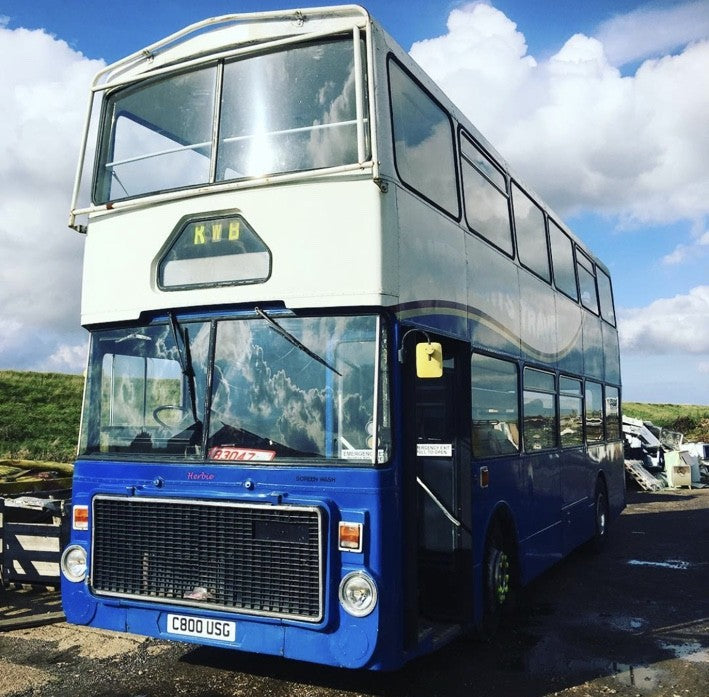 How We Turned an Old Double-Decker Bus into The Rustic Bus