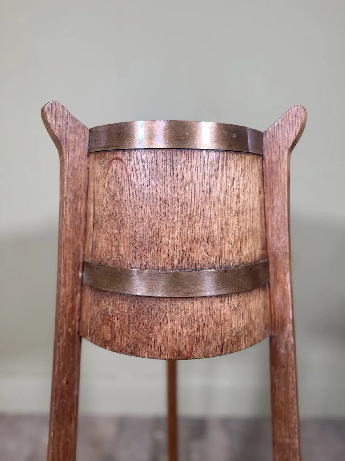 R.A. Lister antique oak jardinière plant stand coopered barrel with copper banding and splayed legs.