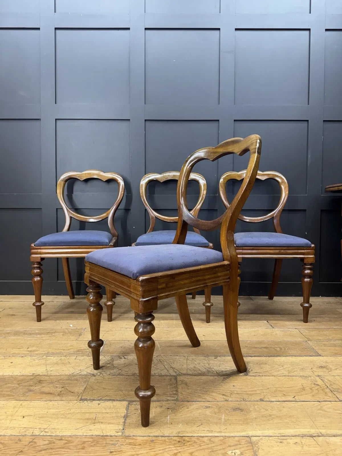 Victorian mahogany dining chairs set of 4, brown with blue patterned upholstery and balloon backs.