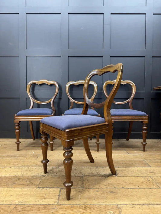 Victorian mahogany dining chairs set of 4, brown with blue patterned upholstery and balloon backs.