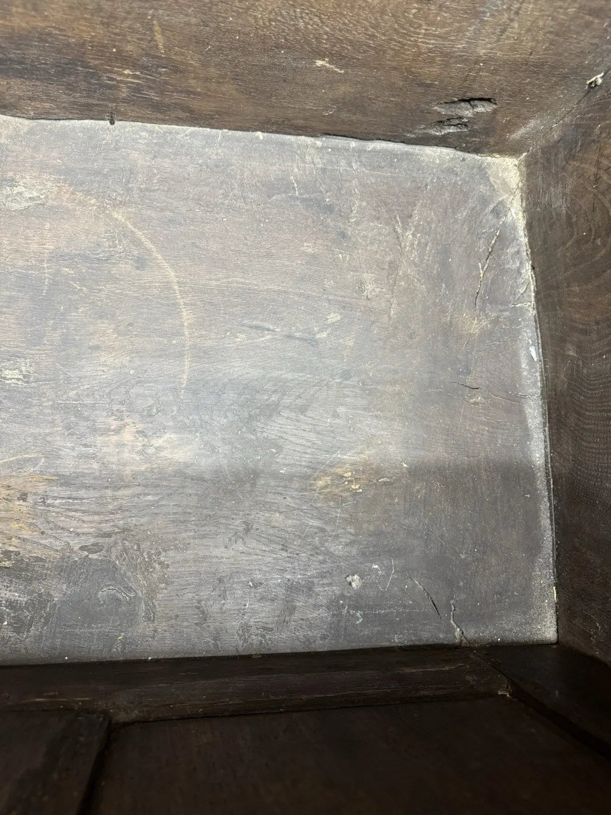 Georgian carved oak hope chest brown with floral motifs and iron hinges.