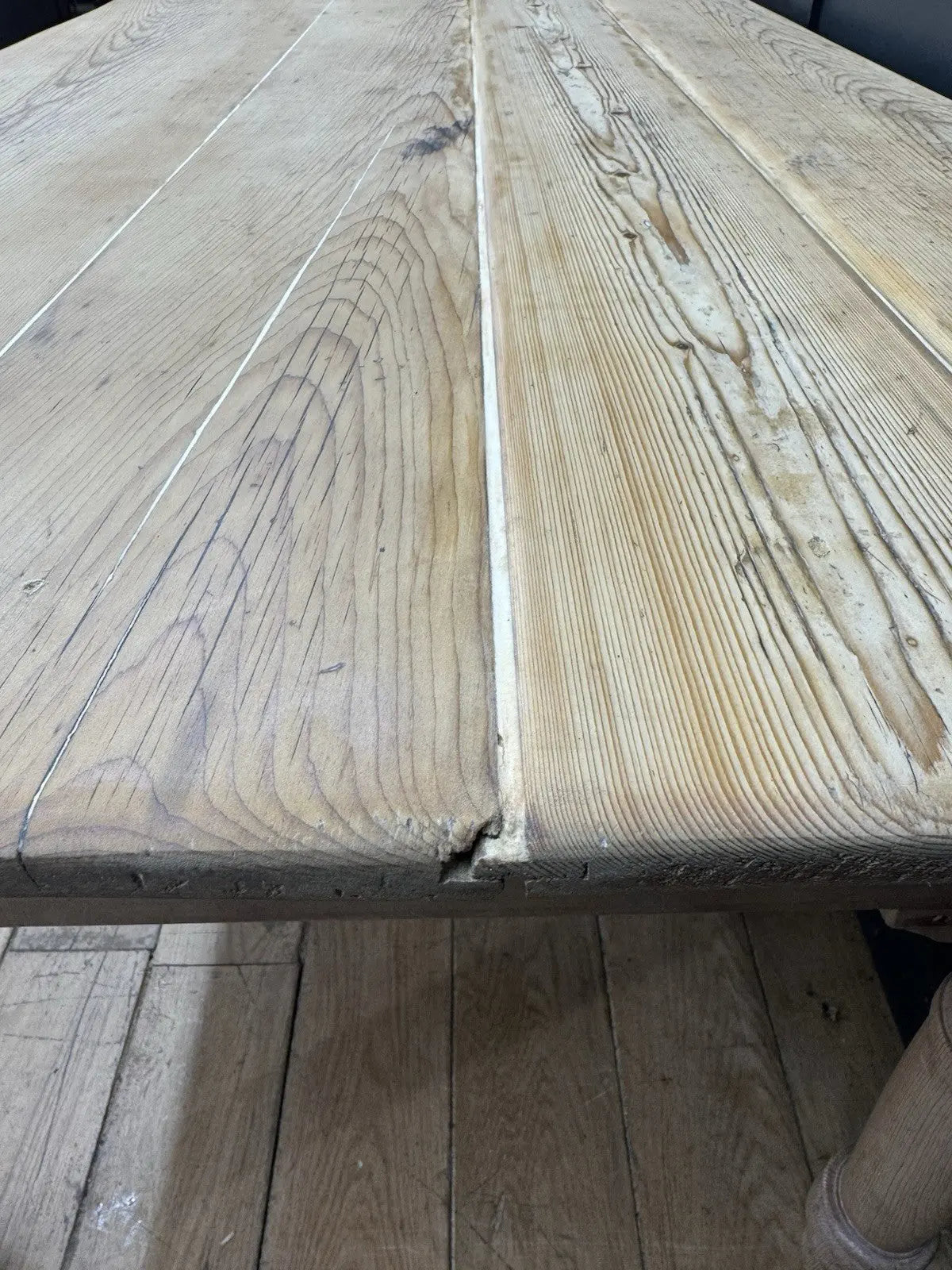 Victorian pine farmhouse dining table brown solid plank top with two drawers and ceramic knobs.