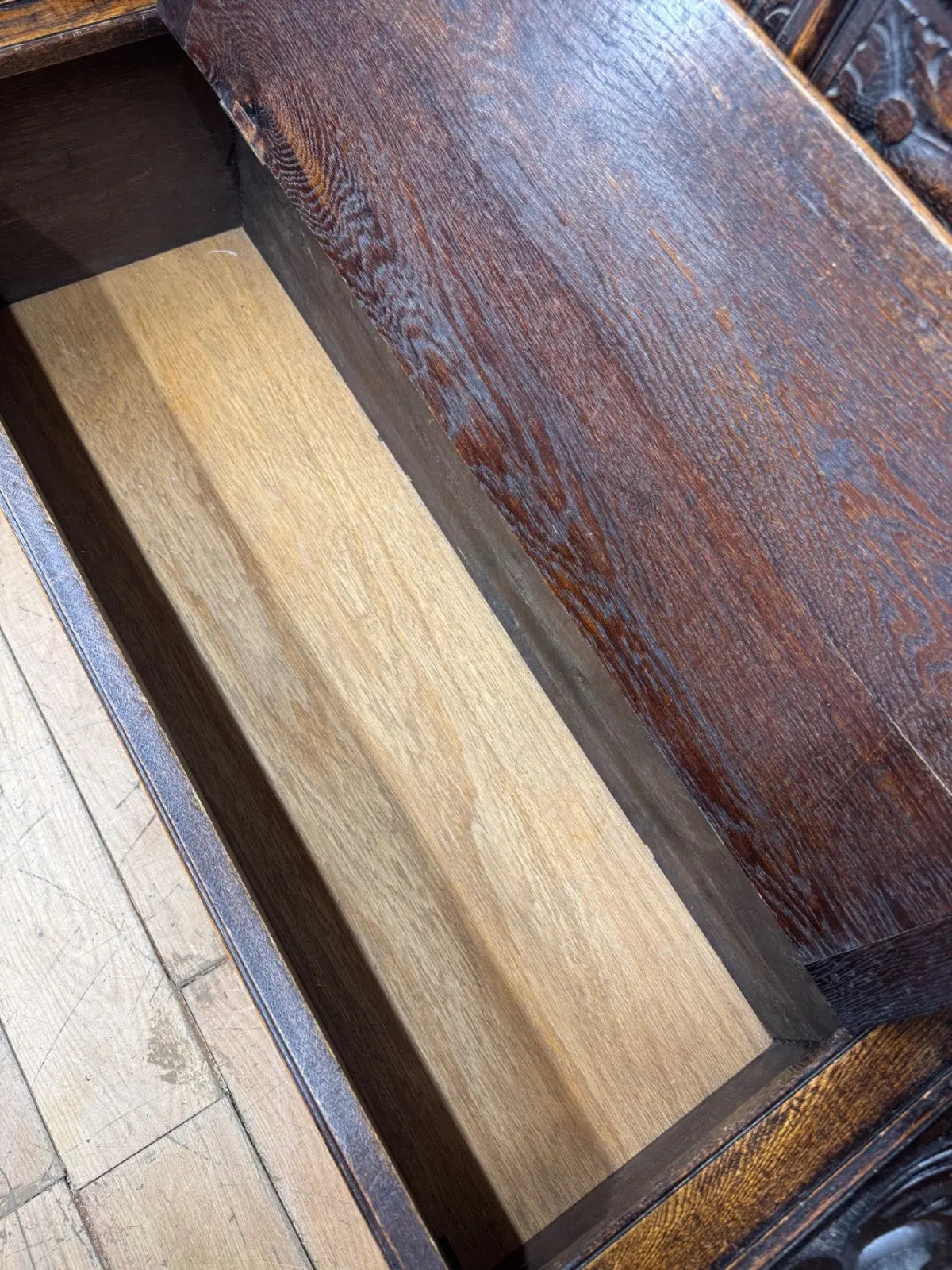 Victorian carved oak hall bench, brown, intricate Gothic Revival carvings and mythical figures.