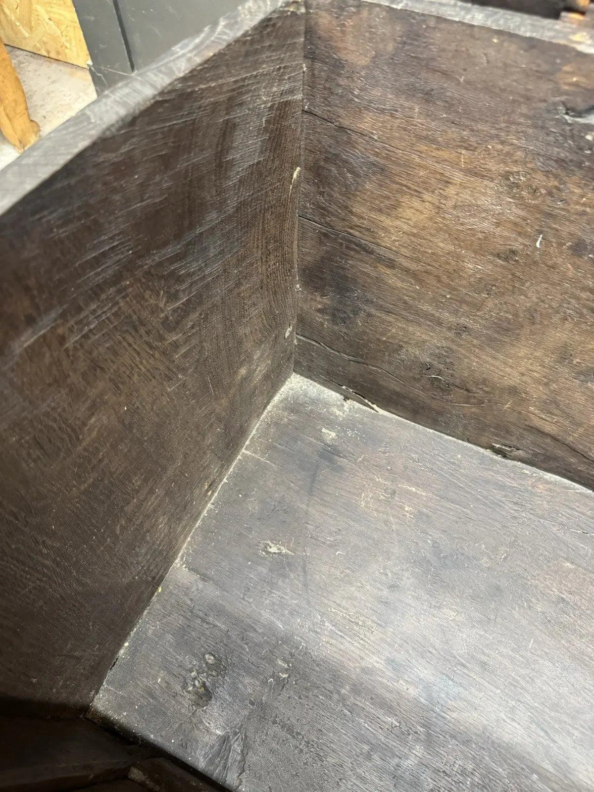 Georgian carved oak hope chest brown with floral motifs and iron hinges.