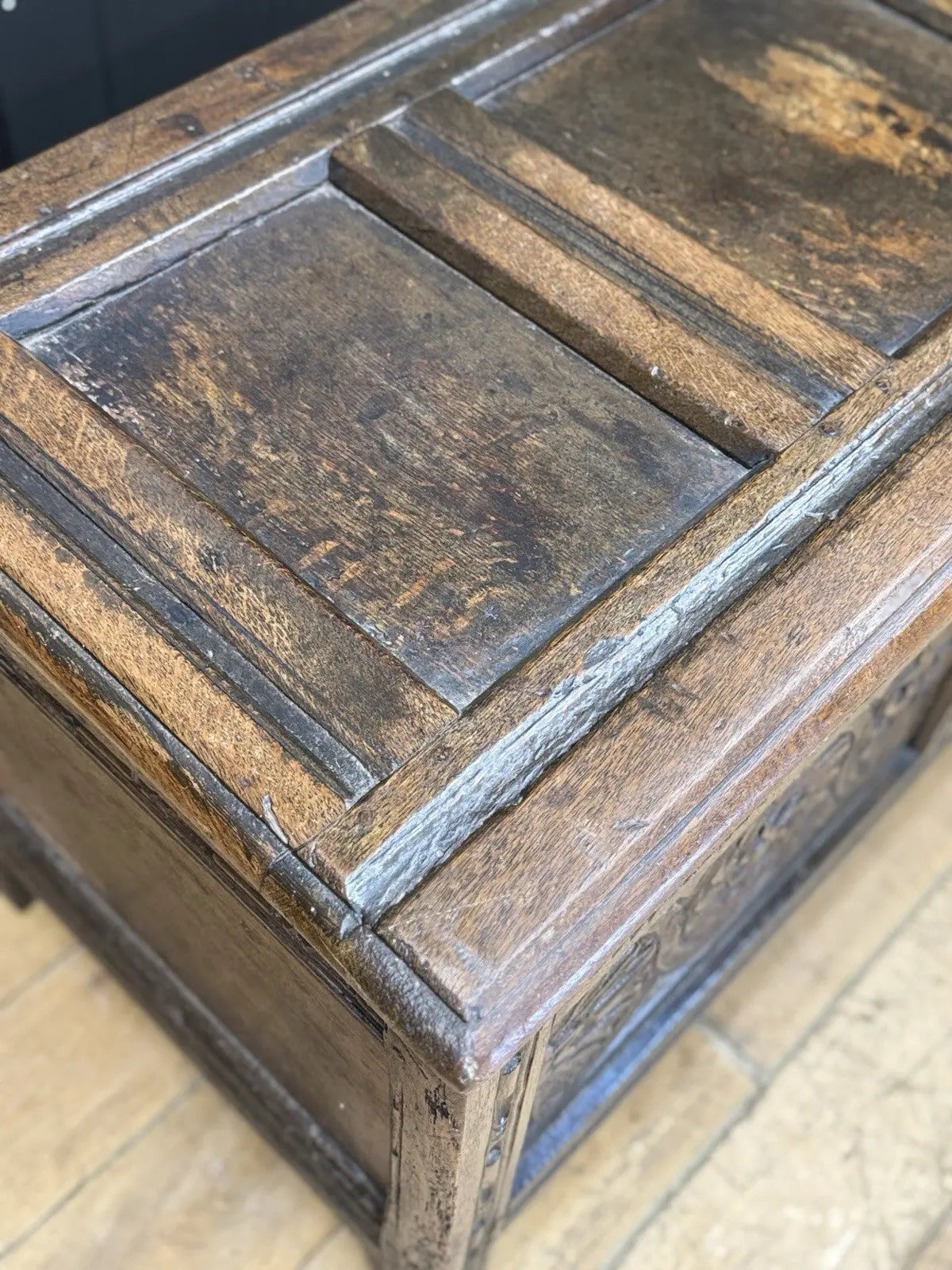 Antique oak hope chest brown with intricate floral carvings and spacious interior.