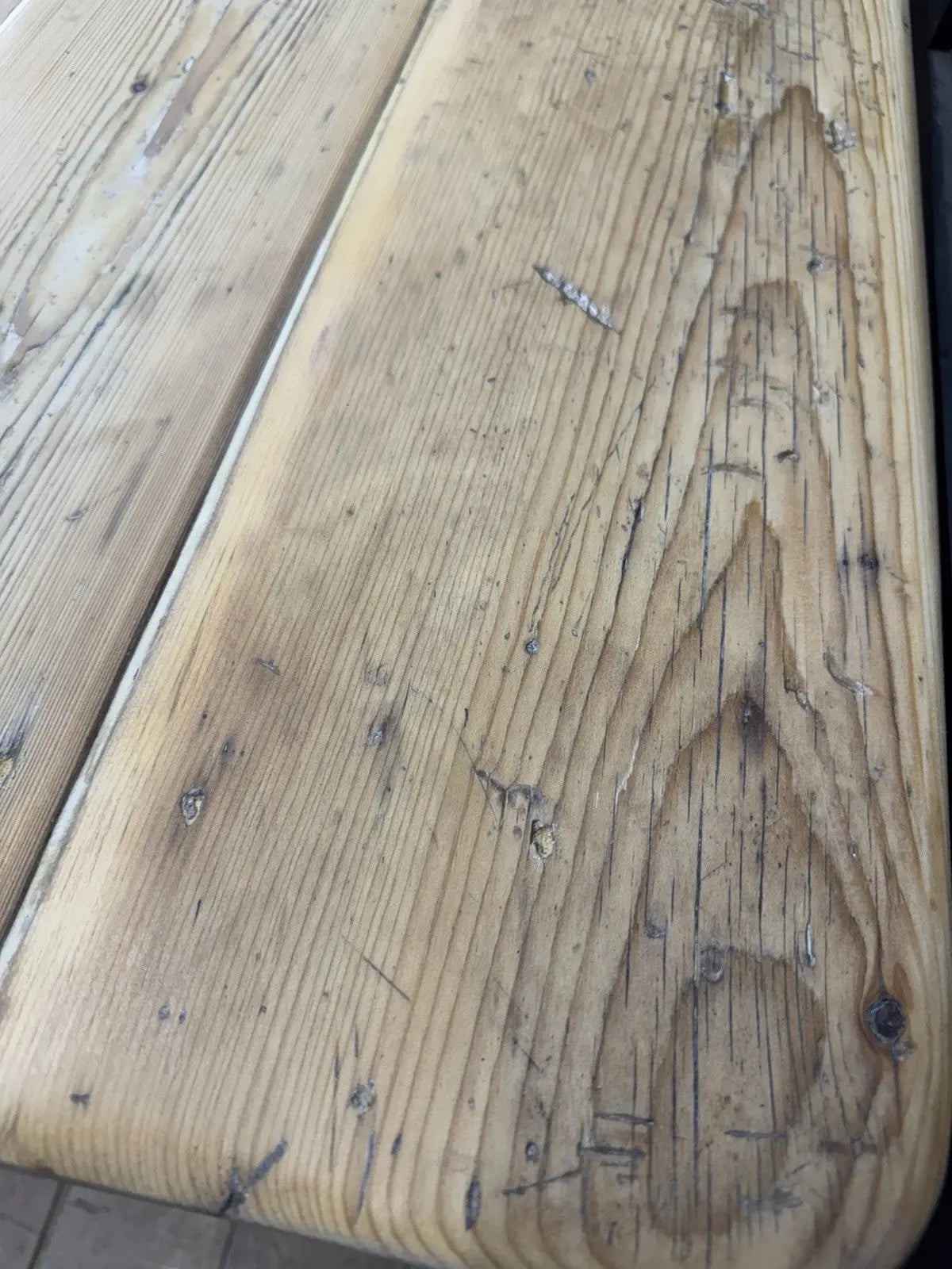 Victorian pine farmhouse dining table brown solid plank top with two drawers and ceramic knobs.