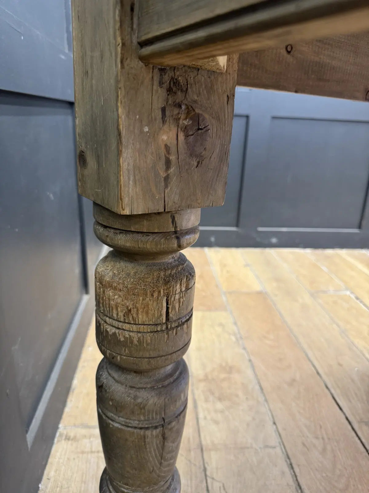 Late Victorian farmhouse kitchen table, scrubbed pine, ring-turned legs, single drawer, timeworn surface.