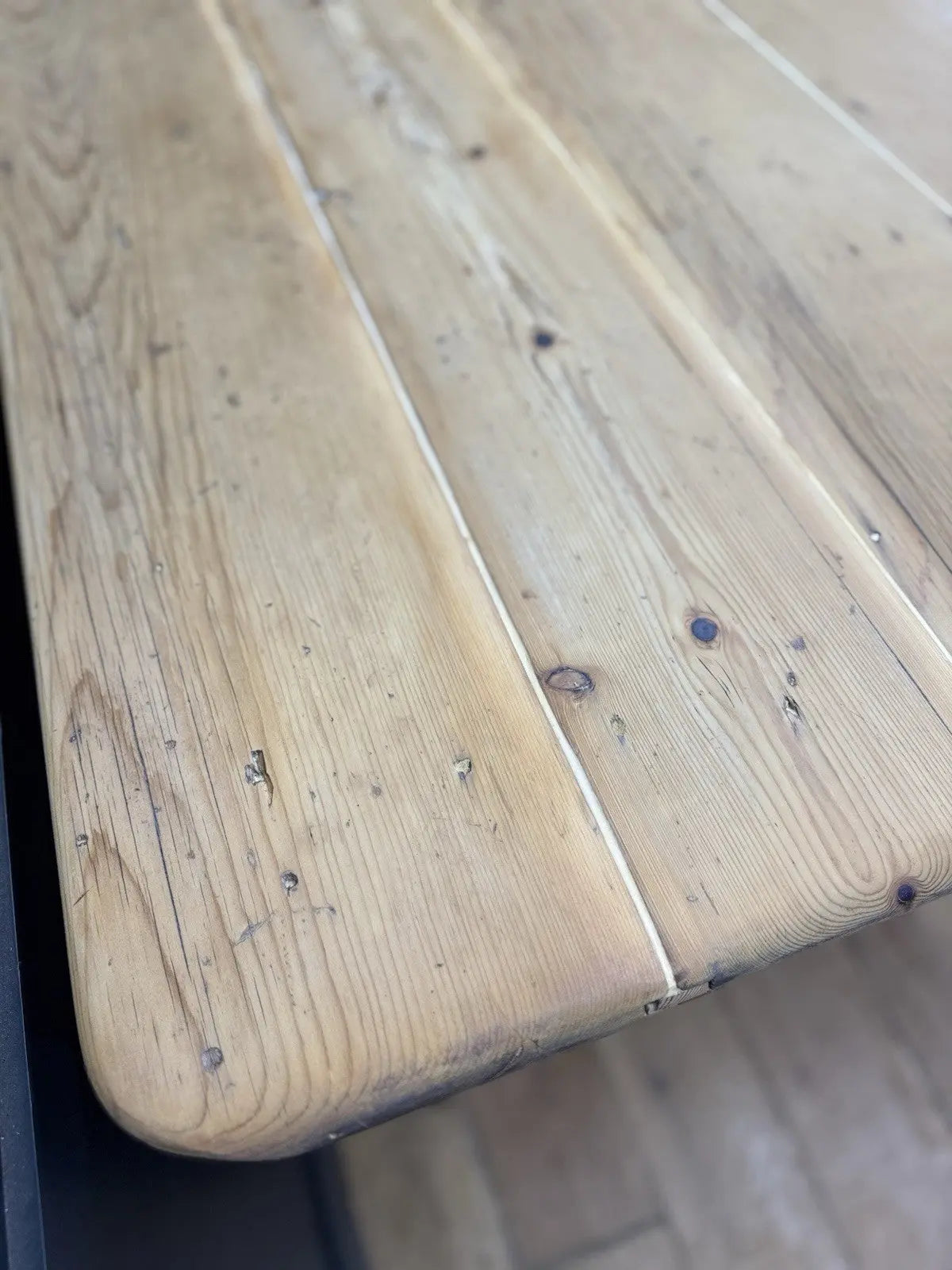 Victorian pine farmhouse dining table brown solid plank top with two drawers and ceramic knobs.
