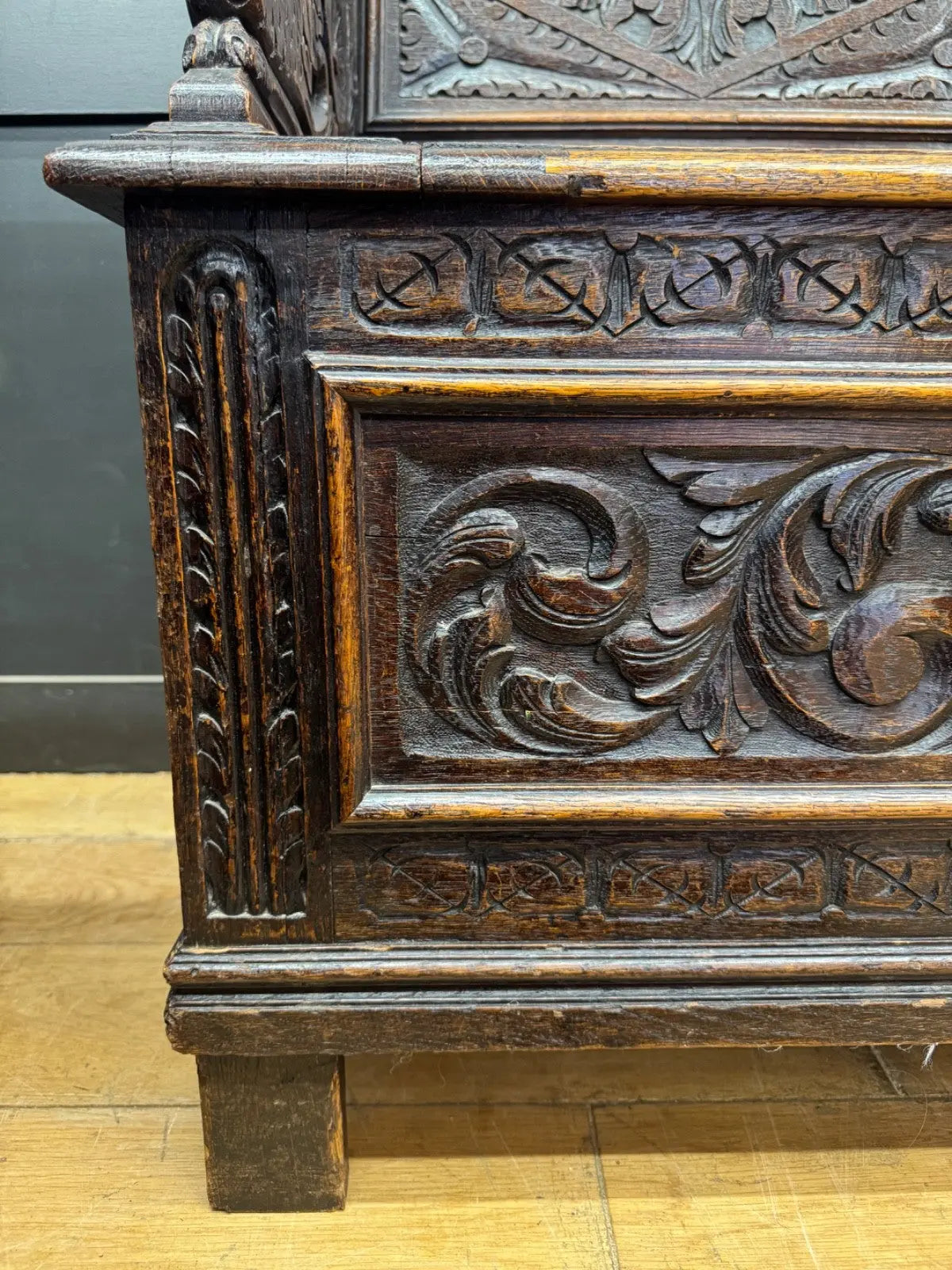 Victorian carved oak hall bench, brown, intricate Gothic Revival carvings and mythical figures.