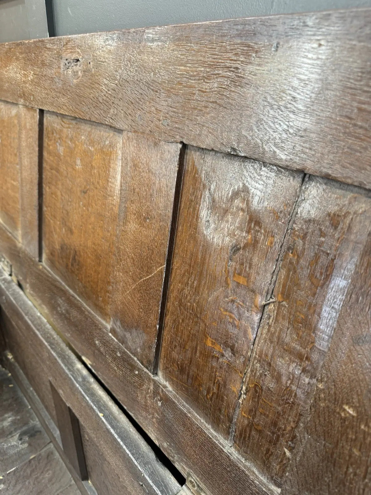 Antique oak hope chest brown with intricate floral carvings and spacious interior.