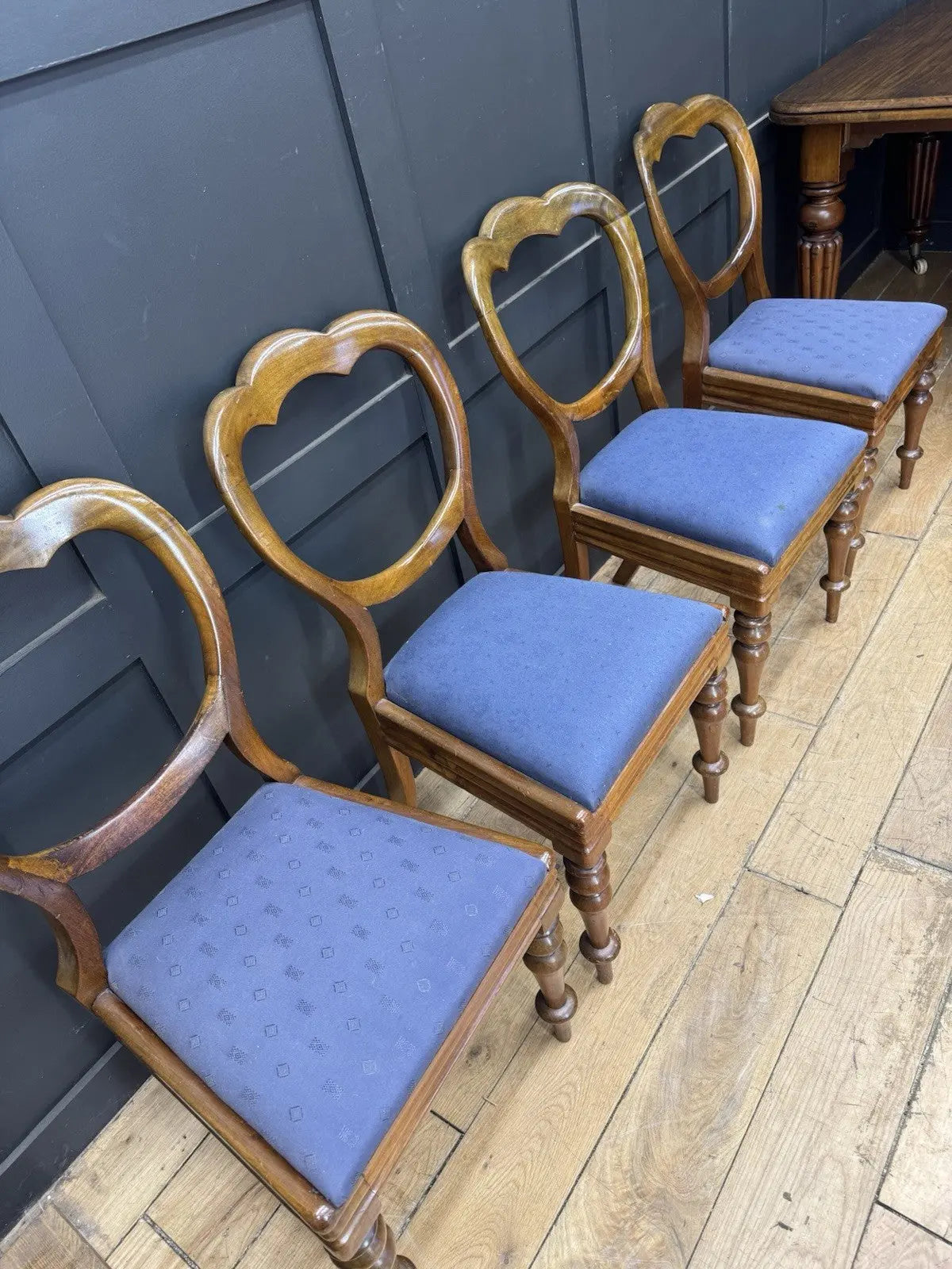 Victorian mahogany dining chairs set of 4, brown with blue patterned upholstery and balloon backs.