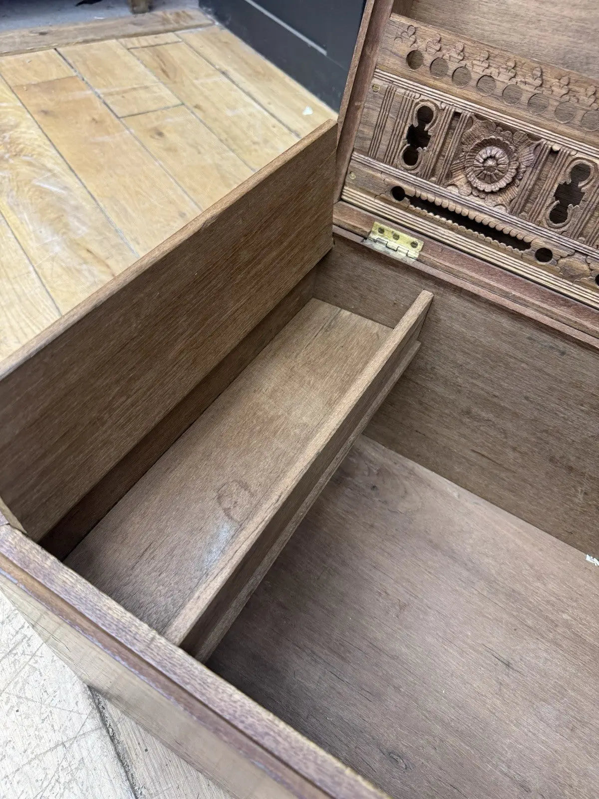 Antique Anglo-Burmese teak campaign chest trunk with brass strapwork and drop-handle.