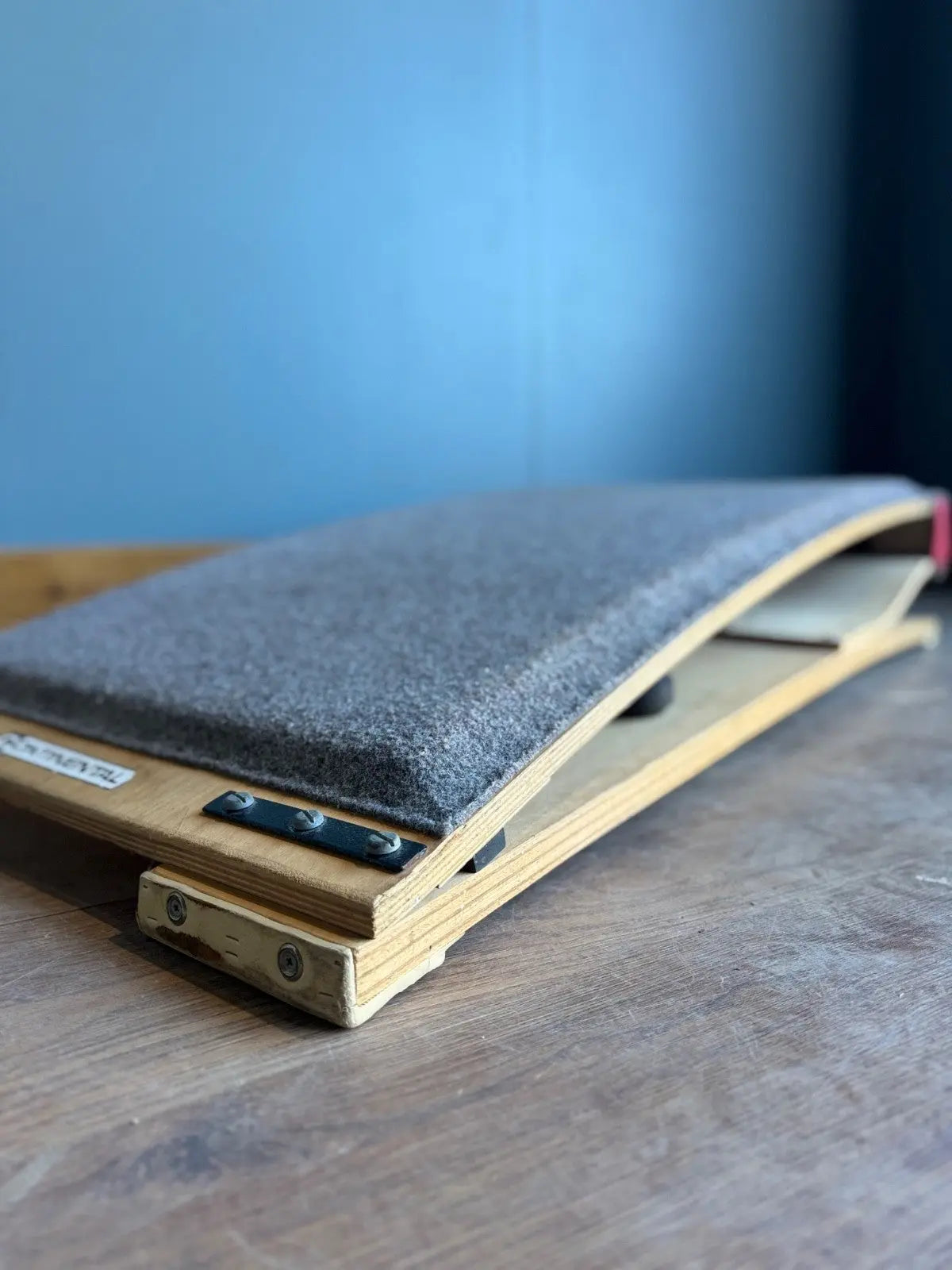 Continental vintage pommel horse grey laminated plywood with original maker's label and padded surface.