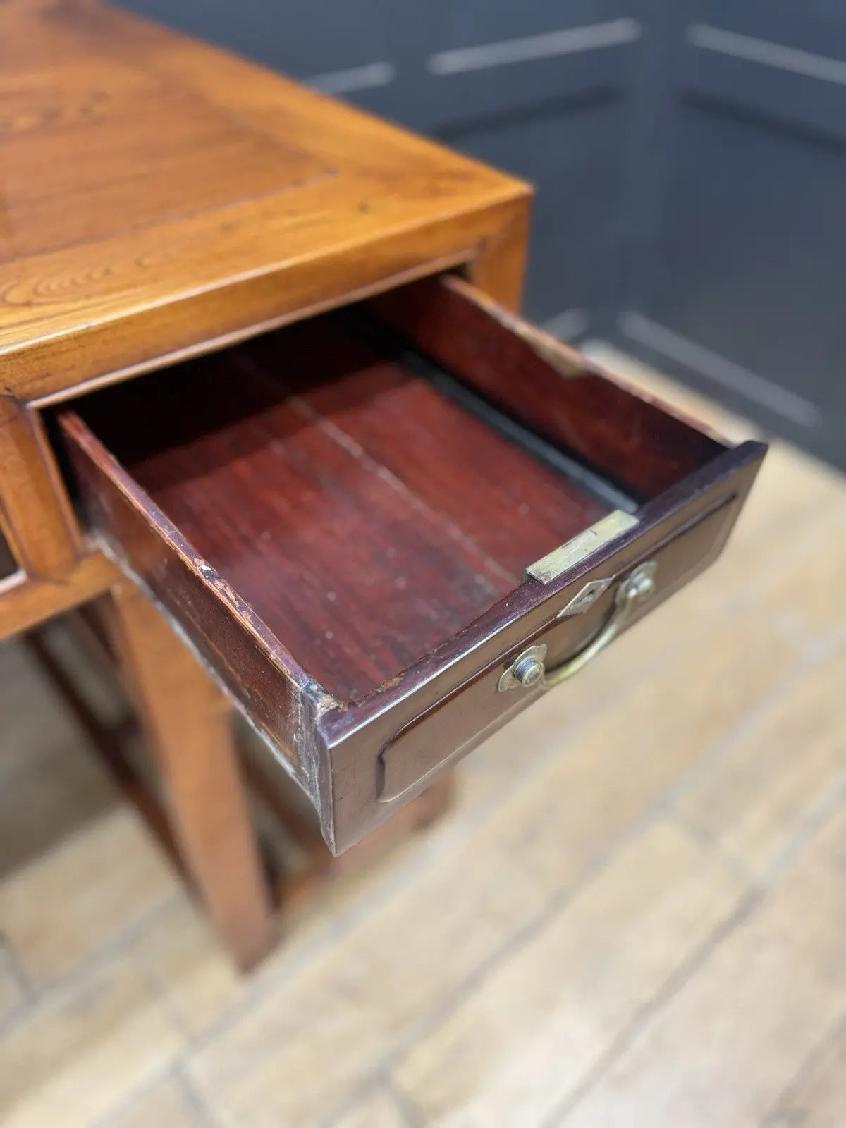 Antique Chinese hardwood writing desk, rich brown finish, elegant traditional pedestal design.