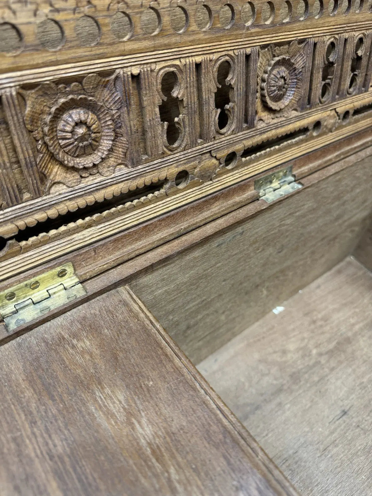 Antique Anglo-Burmese teak campaign chest trunk with brass strapwork and drop-handle.