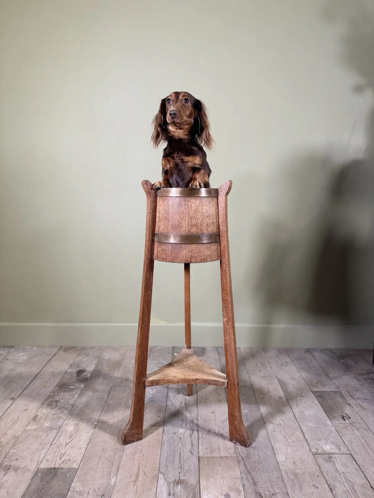 R.A. Lister antique oak jardinière plant stand coopered barrel with copper banding and splayed legs.