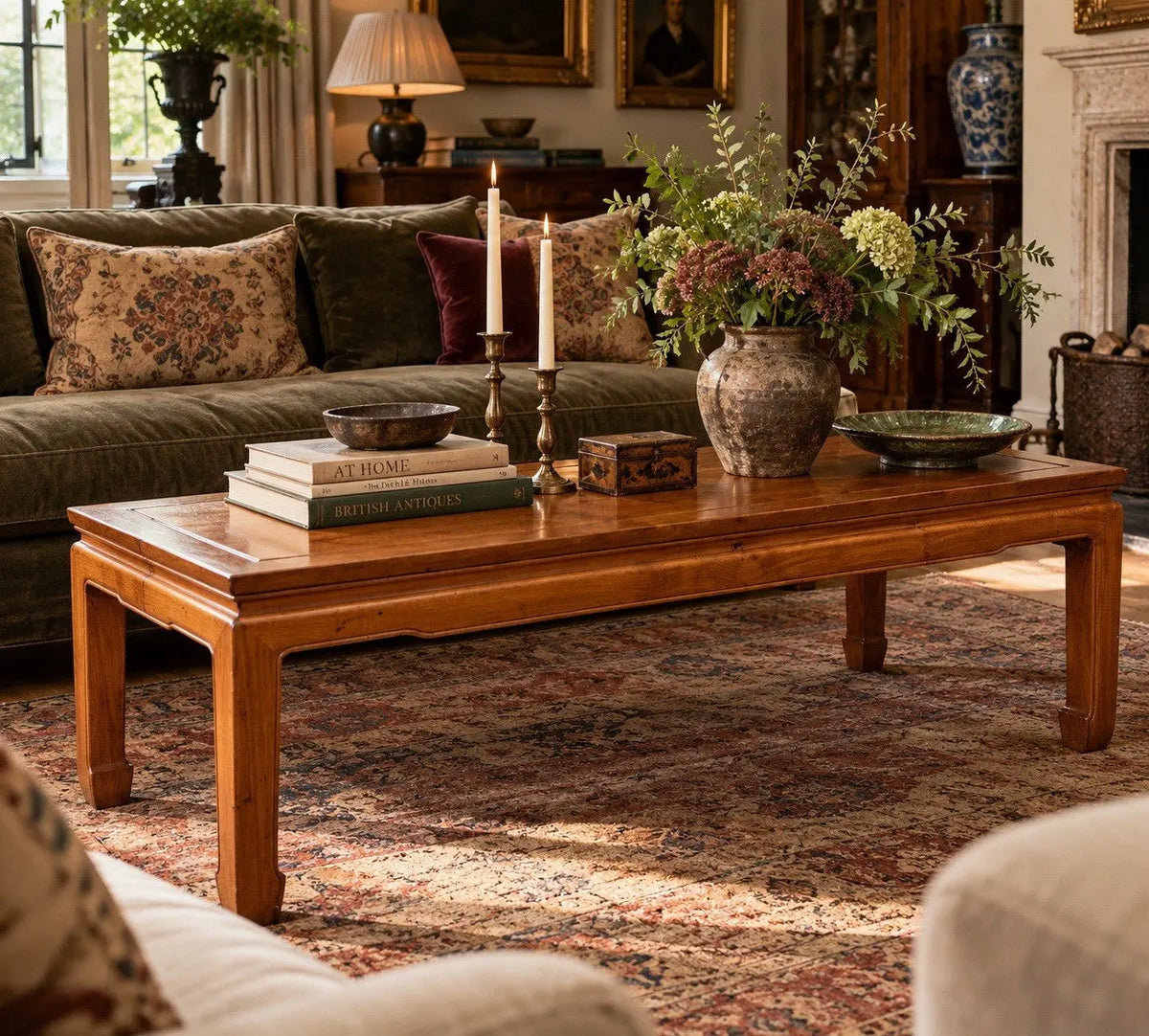 Contemporary Chinese hardwood coffee table brown rectangular top with framed construction and square legs.