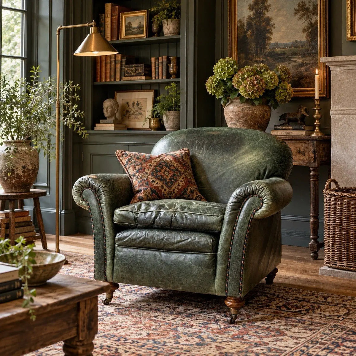 Tetrad green leather armchair with gathered detailing, twisted piping, and original manufacturer's label.