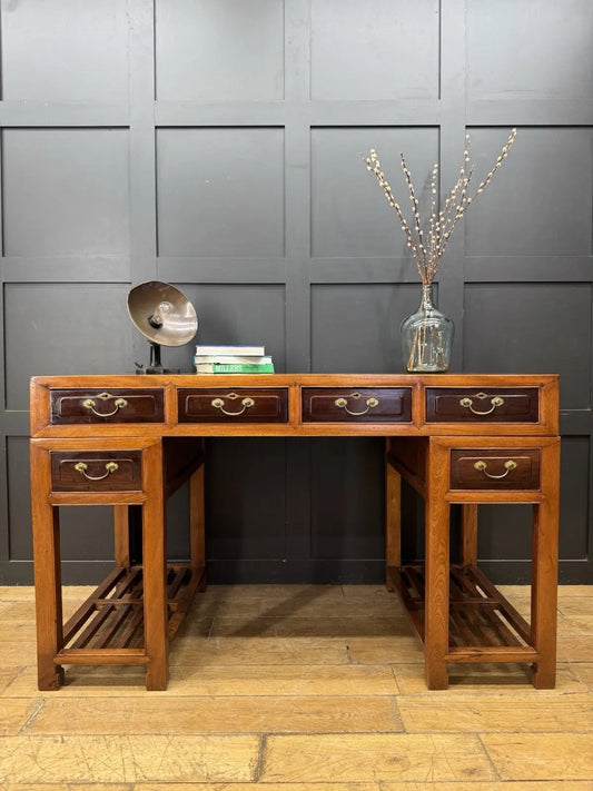 Antique Chinese hardwood writing desk, rich brown finish, elegant traditional pedestal design.
