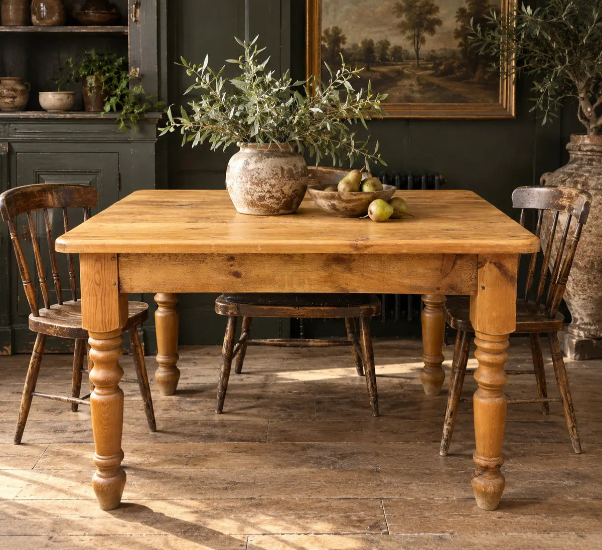 Pine farmhouse dining table brown rectangular top with turned legs and natural grain.