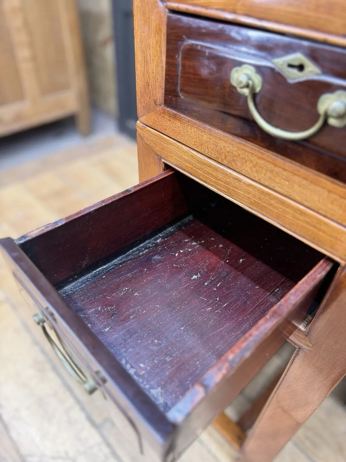 Antique Chinese hardwood writing desk, rich brown finish, elegant traditional pedestal design.