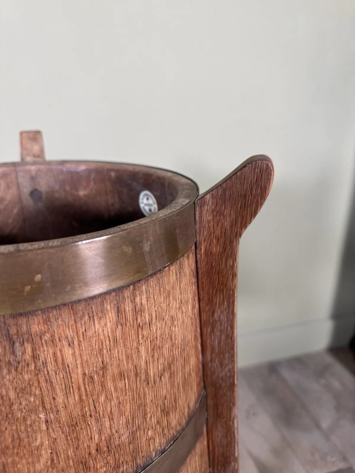 R.A. Lister antique oak jardinière plant stand coopered barrel with copper banding and splayed legs.