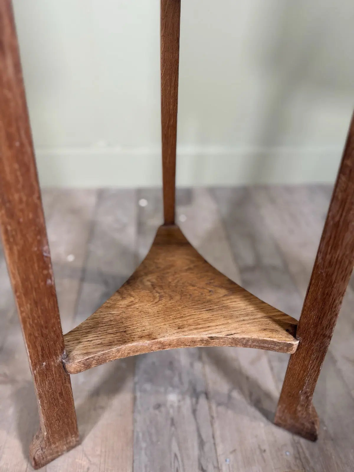 R.A. Lister antique oak jardinière plant stand coopered barrel with copper banding and splayed legs.