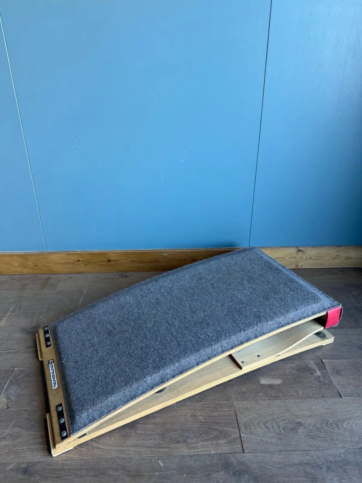 Continental vintage pommel horse grey laminated plywood with original maker's label and padded surface.