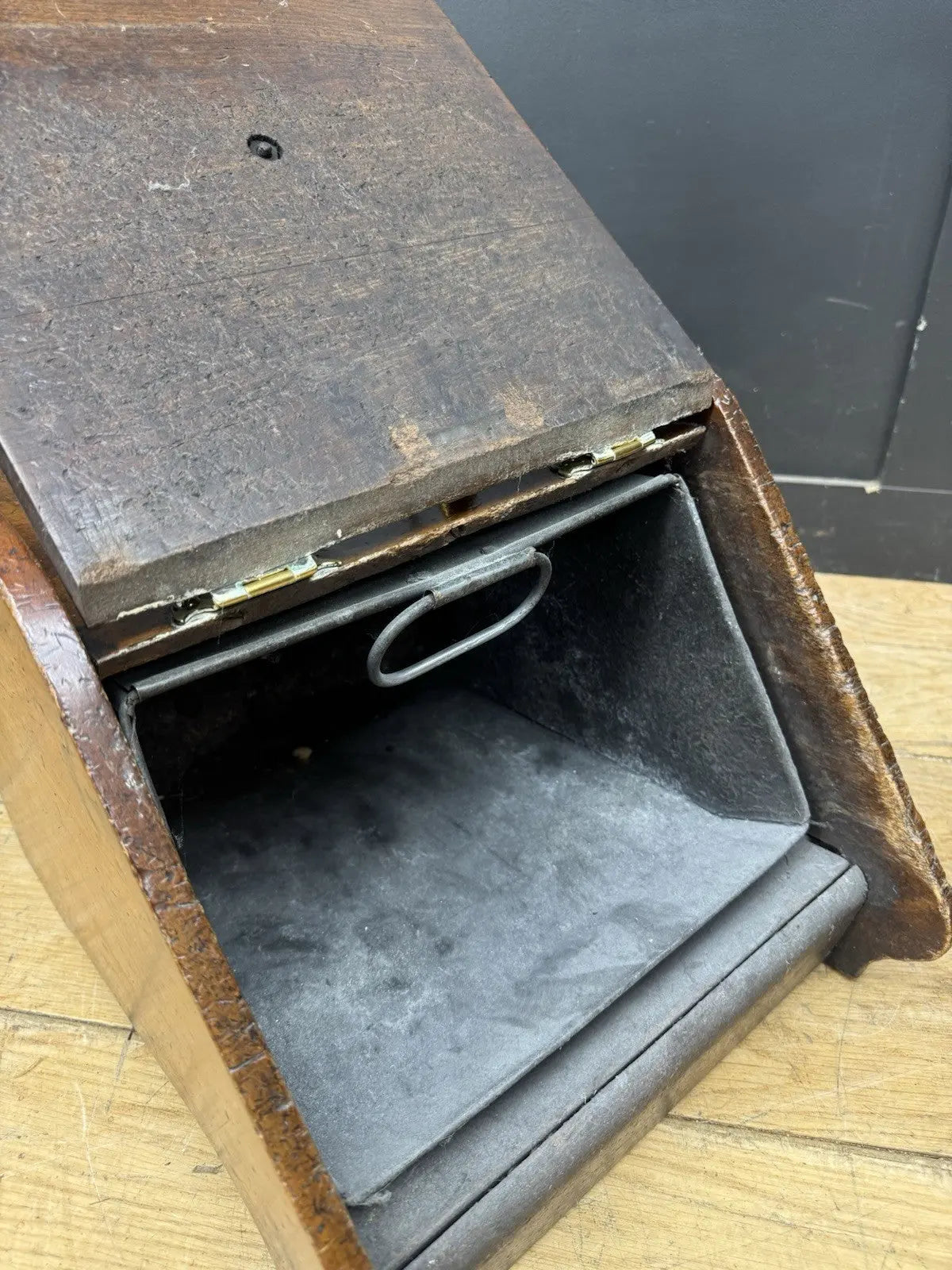 Victorian walnut coal purdonium scuttle box with brass fittings and ornate handle.