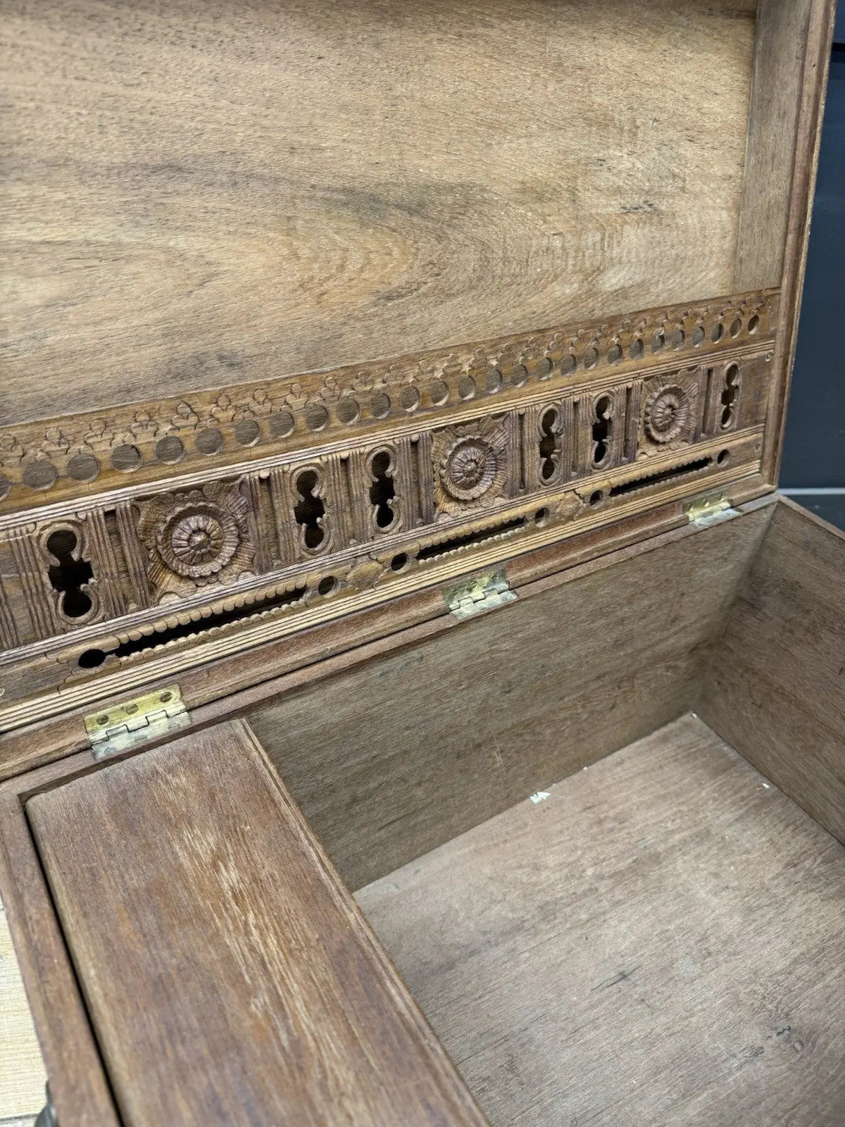Antique Anglo-Burmese teak campaign chest trunk with brass strapwork and drop-handle.