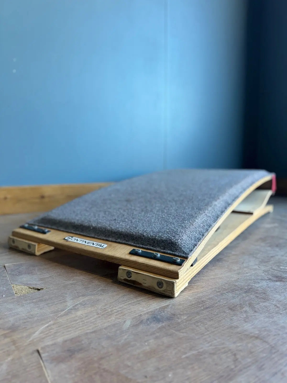 Continental vintage pommel horse grey laminated plywood with original maker's label and padded surface.
