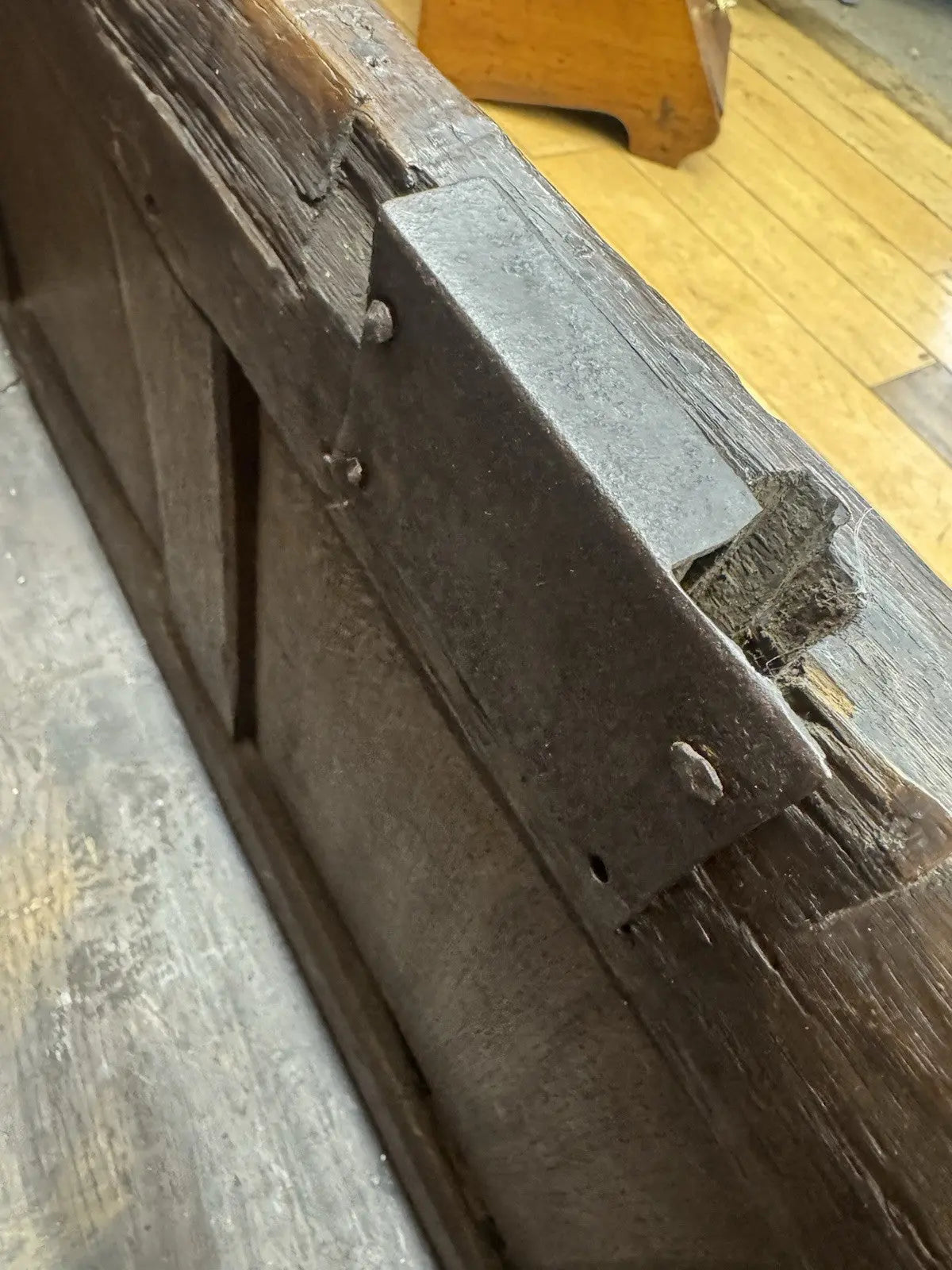Georgian carved oak hope chest brown with floral motifs and iron hinges.