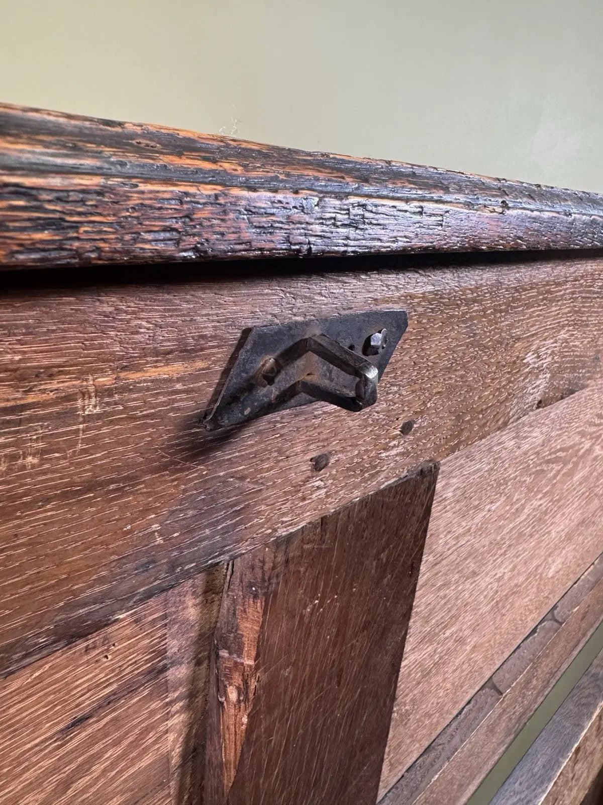 Antique oak mule chest brown four-panelled design with two drawers and rich grain.