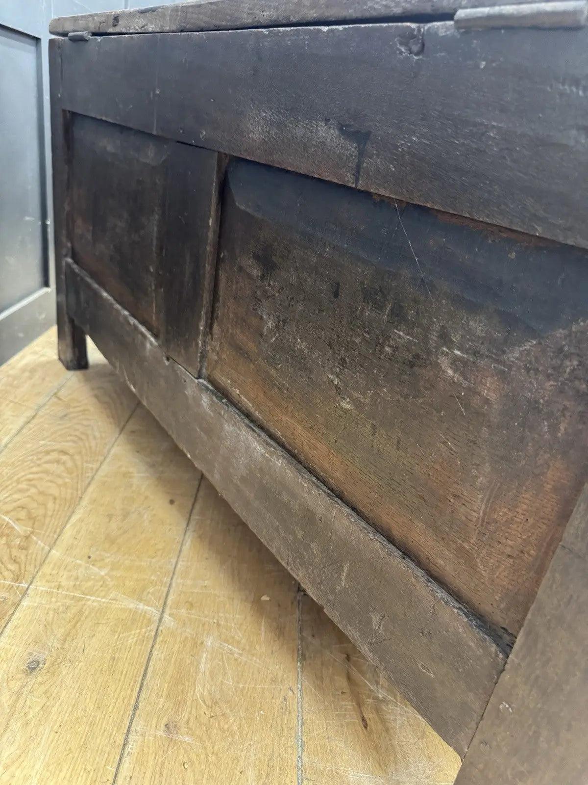 Antique oak hope chest brown with intricate floral carvings and spacious interior.