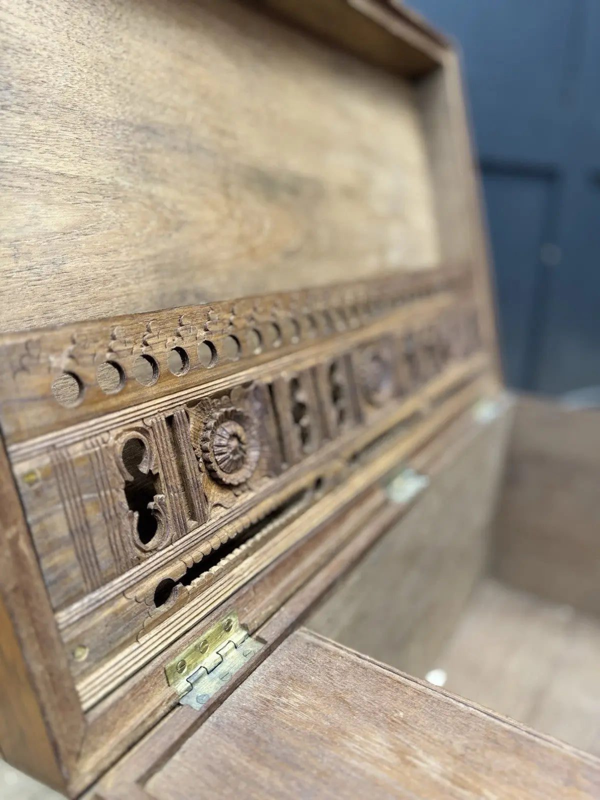 Antique Anglo-Burmese teak campaign chest trunk with brass strapwork and drop-handle.