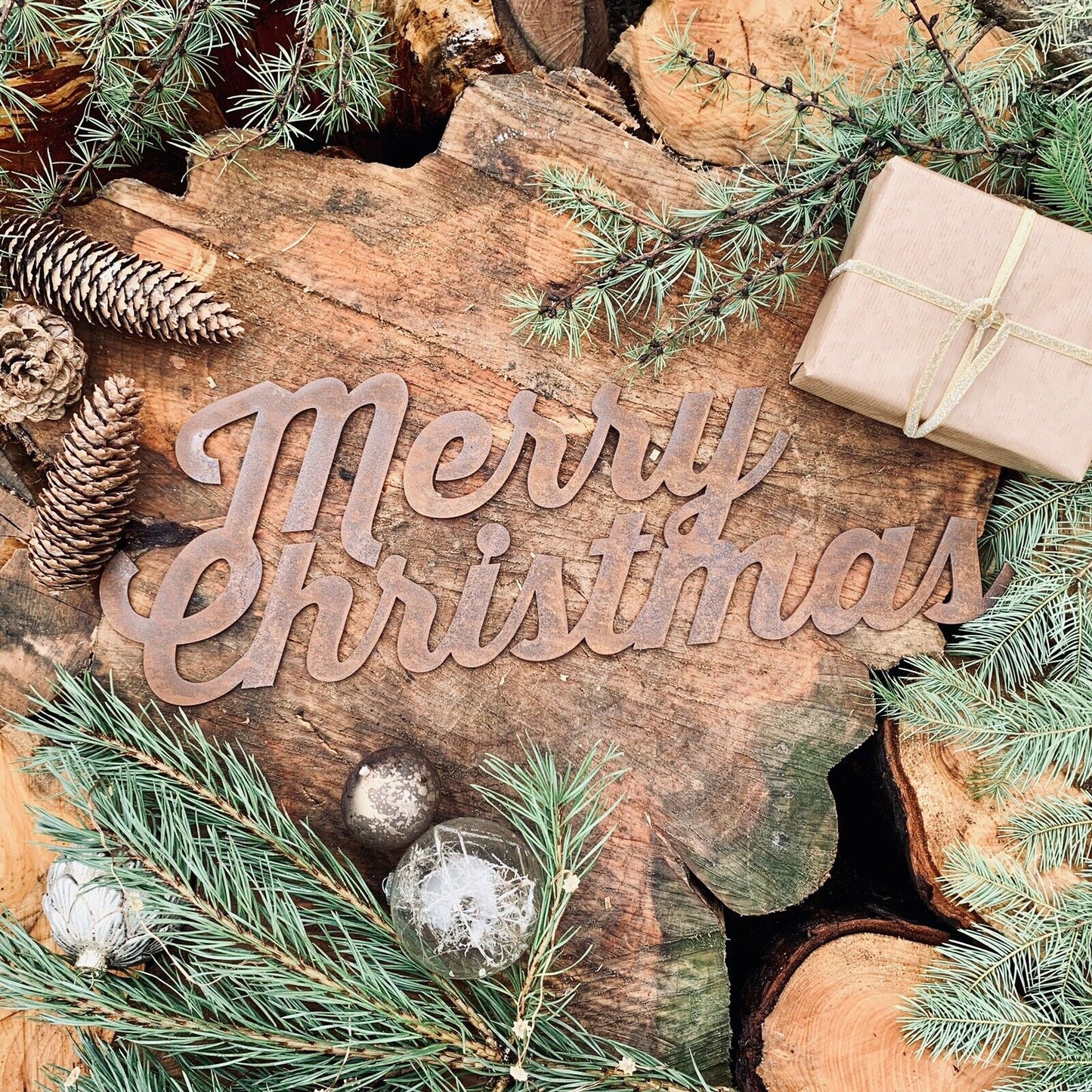 Rusted metal merry Christmas word sign