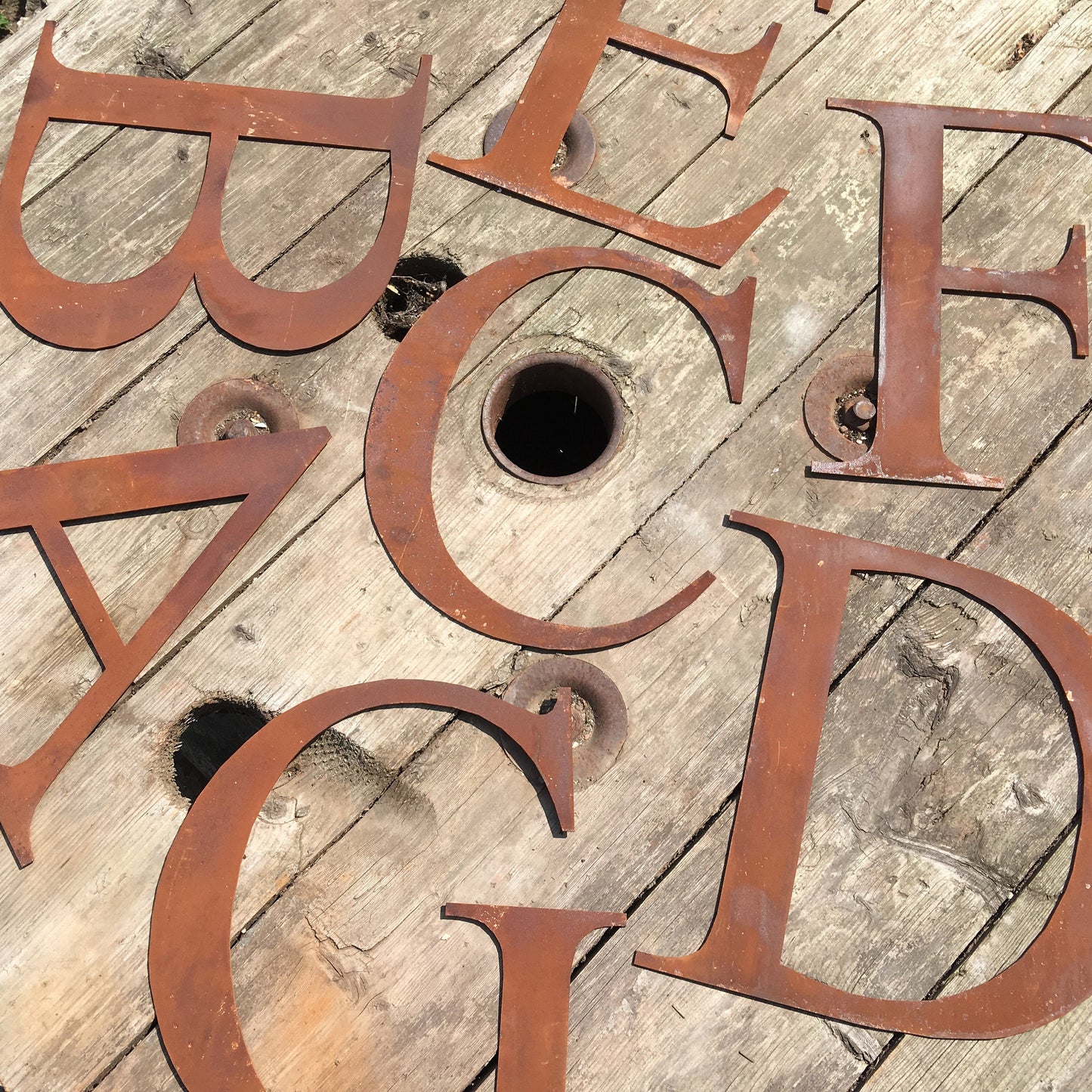 Mixed rusty metal letters 12" tall