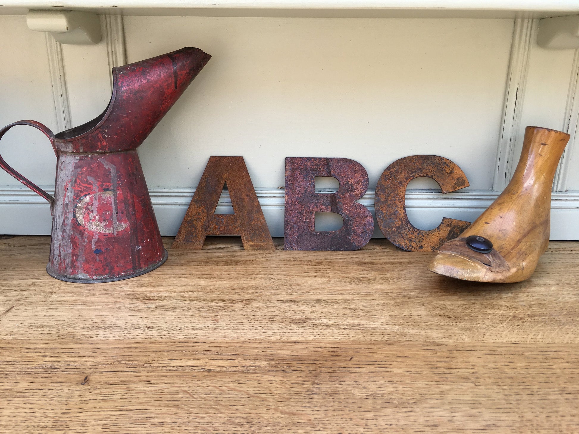 5" fat rusty lettering spelling out ABC