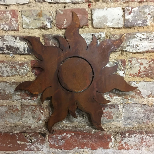 Rusty metal sun wall decoration