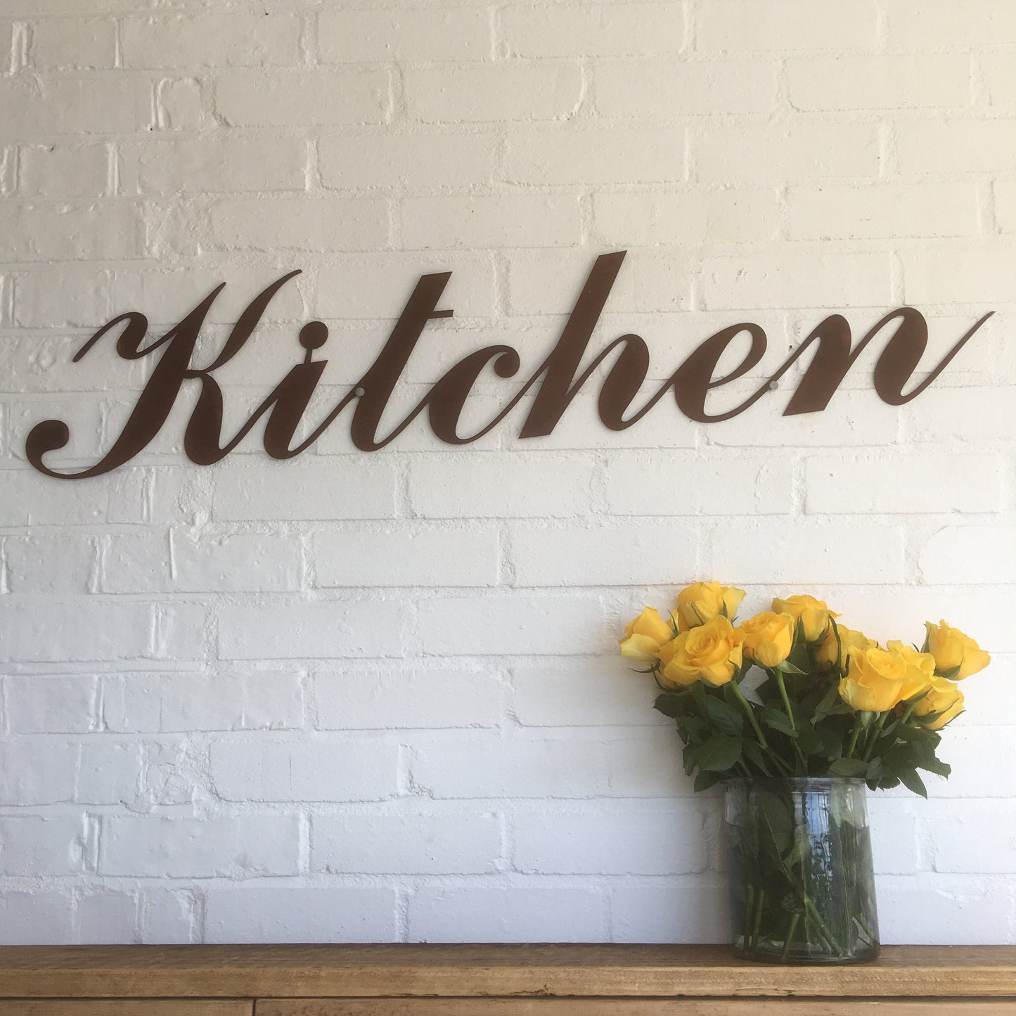 rusty metal kitchen sign