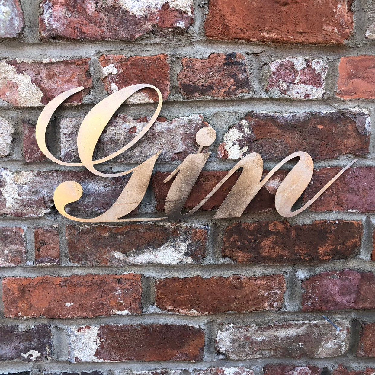 Distressed gold gin sign