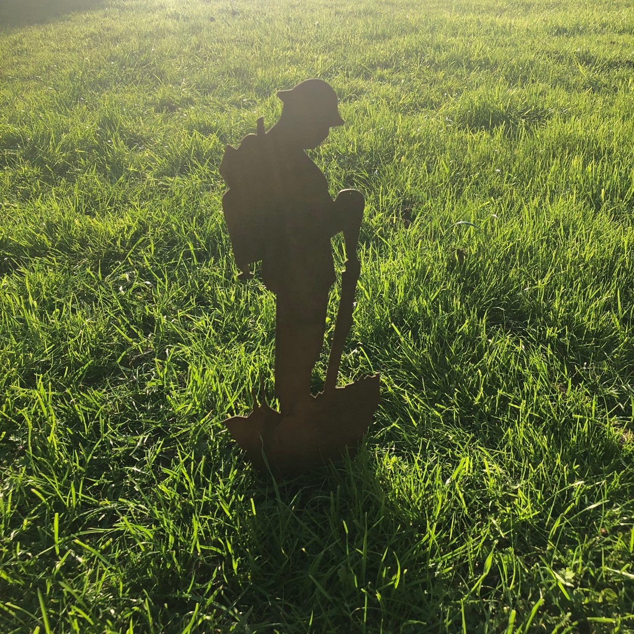 Small Rusty Metal Soldier Garden Statue