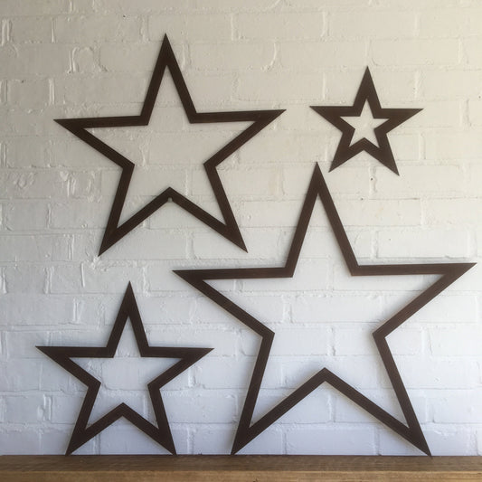 set of 4 rusty metal hollow stars 