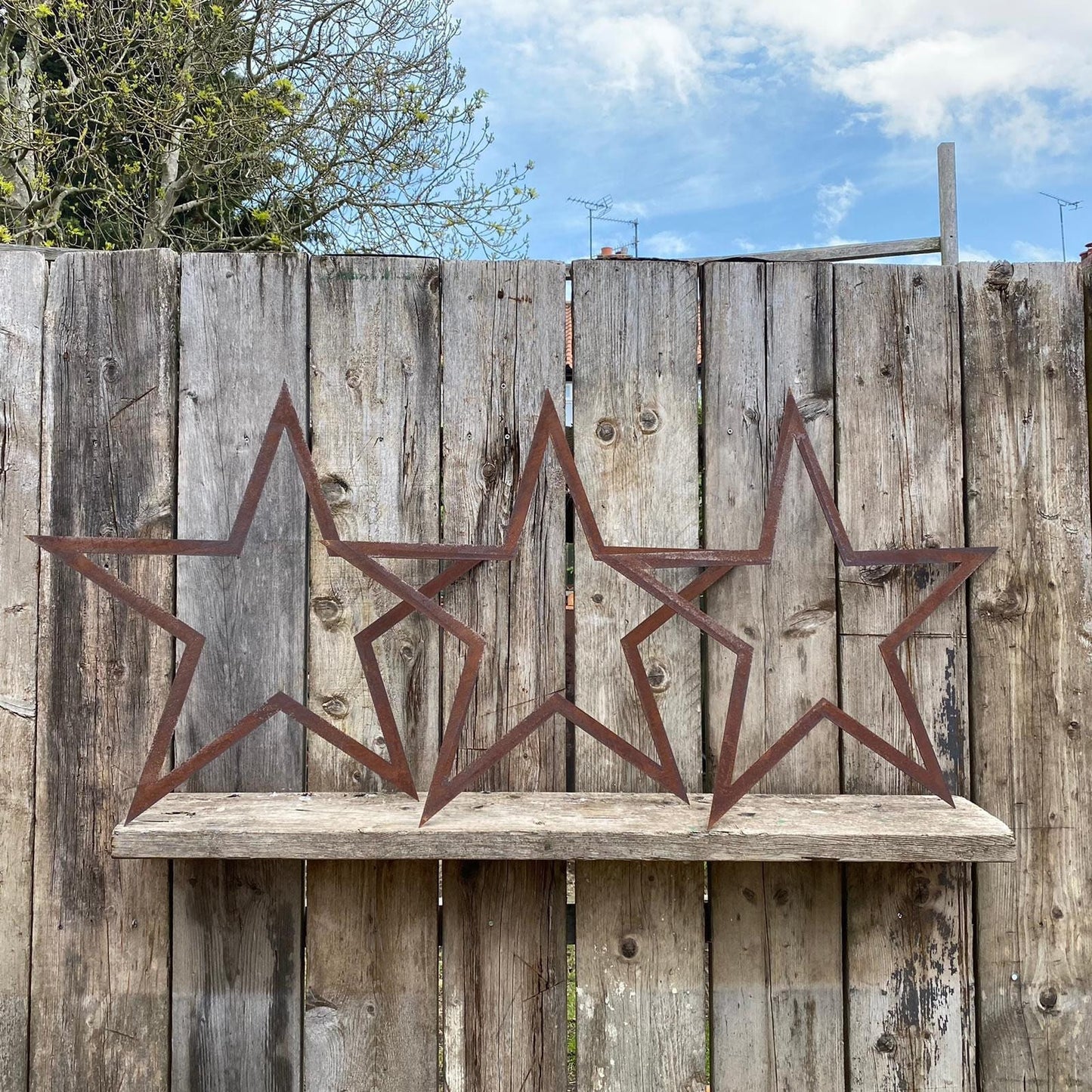 3x rusty metal hollow stars decorations- 70cms tall