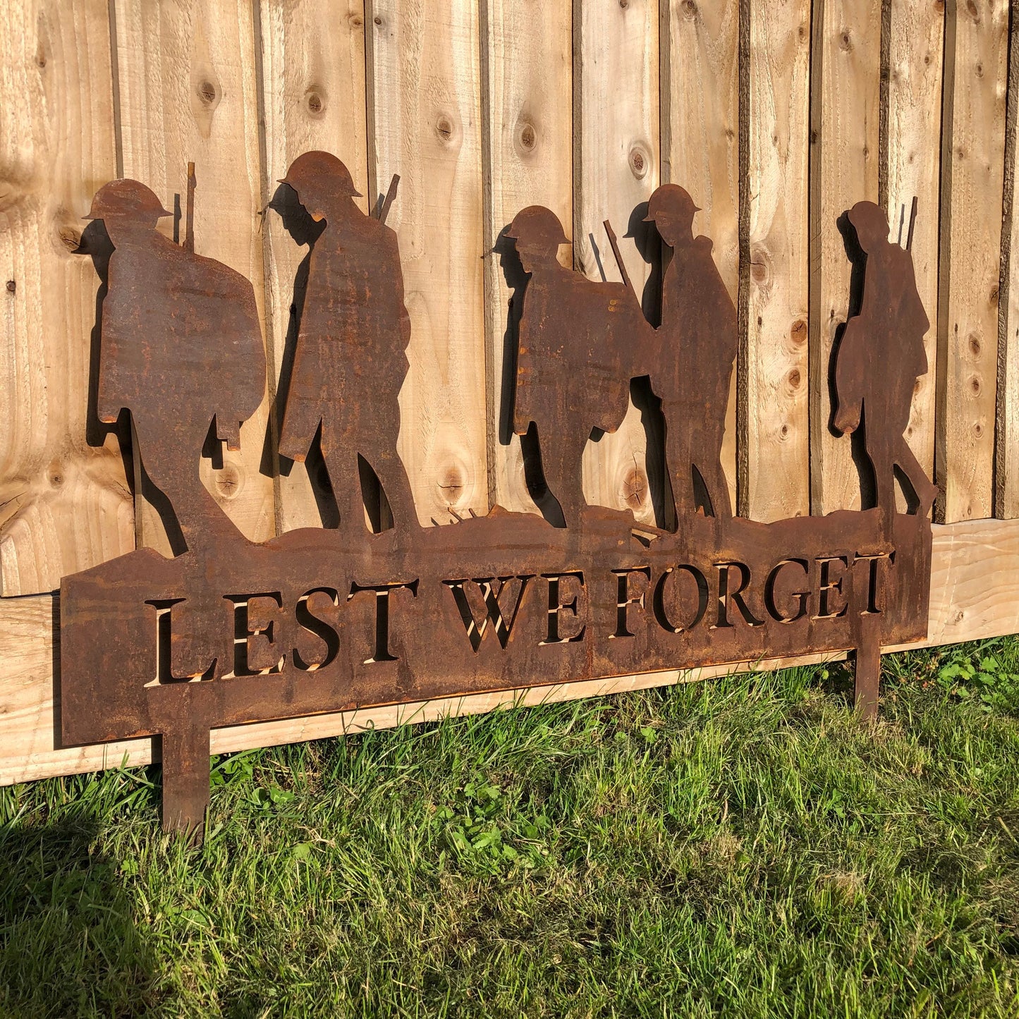 A Rusty Metal Lest We Forget Soldier Scene Garden Decoration