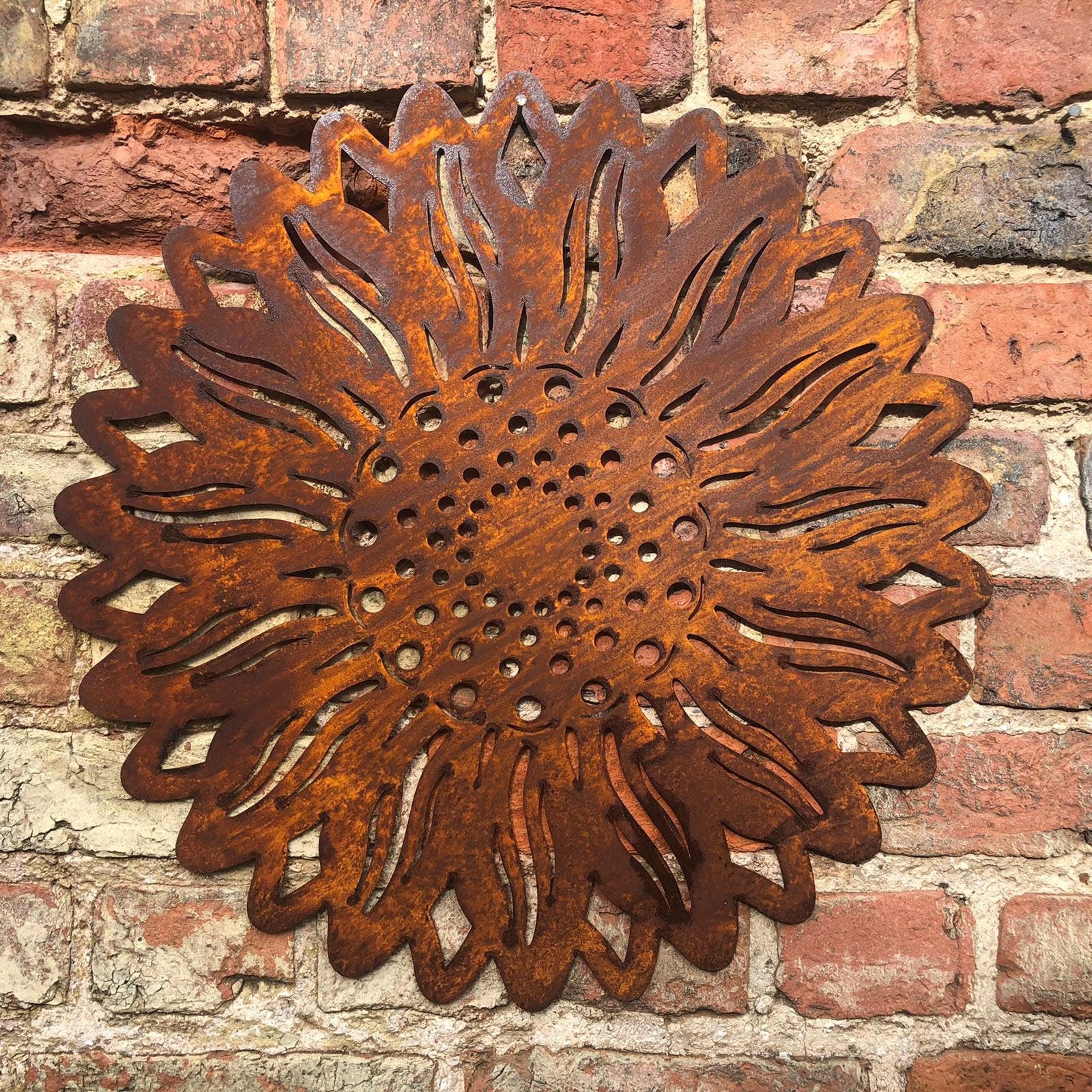 Rusty metal sunflower wall decoration