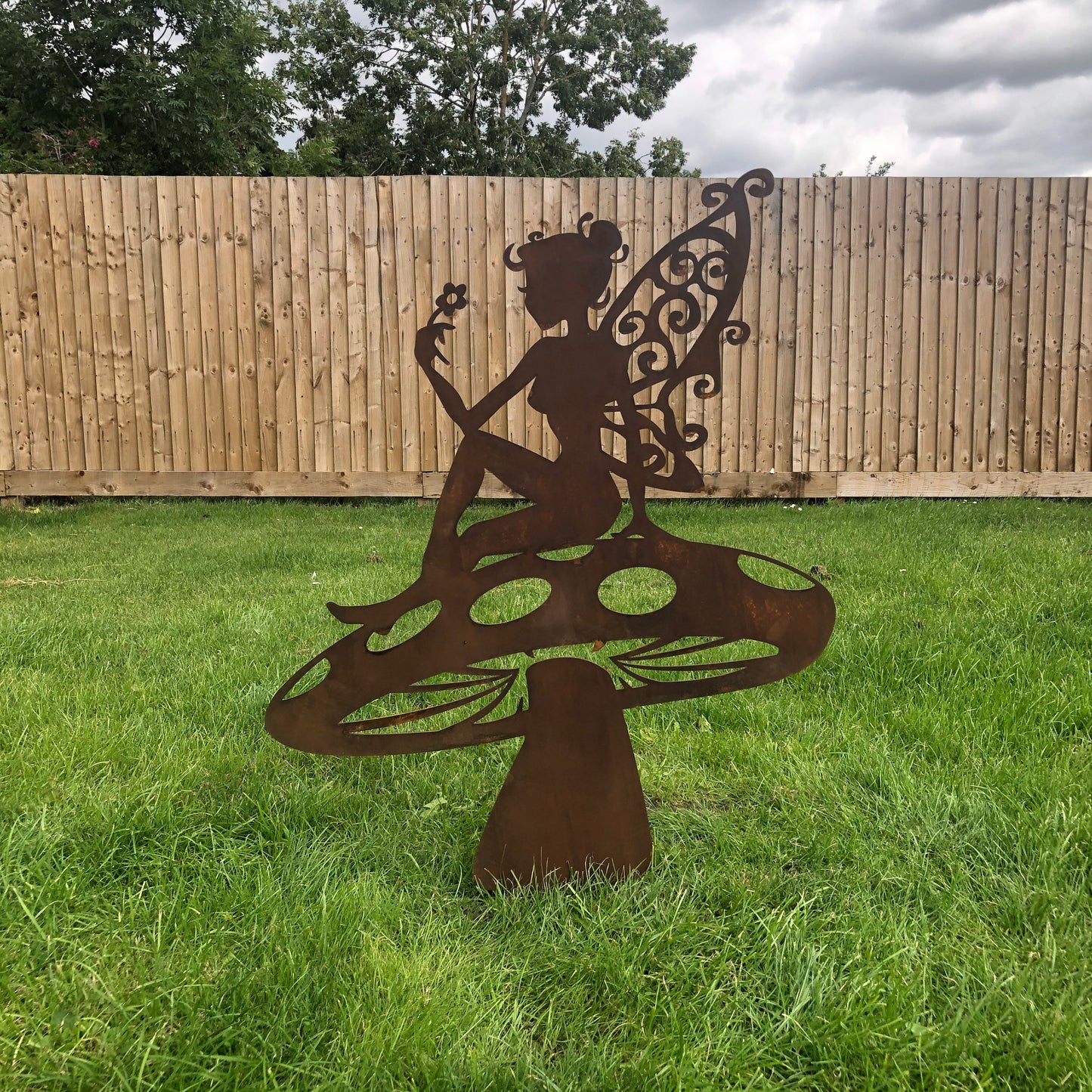 Fairy  on a toadstool garden decoration